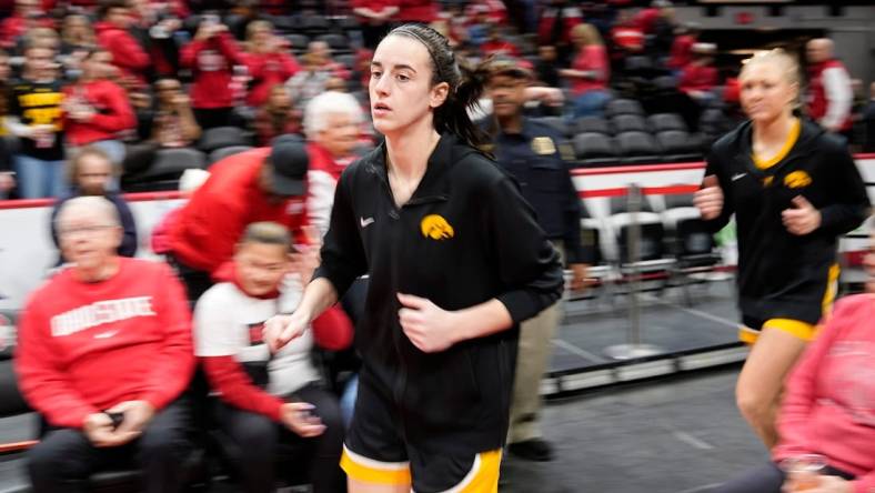 Jan 21, 2024; Columbus, Ohio, USA; Iowa Hawkeyes guard Caitlin Clark (22) takes the court for warm ups prior to the NCAA women   s basketball game against the Ohio State Buckeyes at Value City Arena.