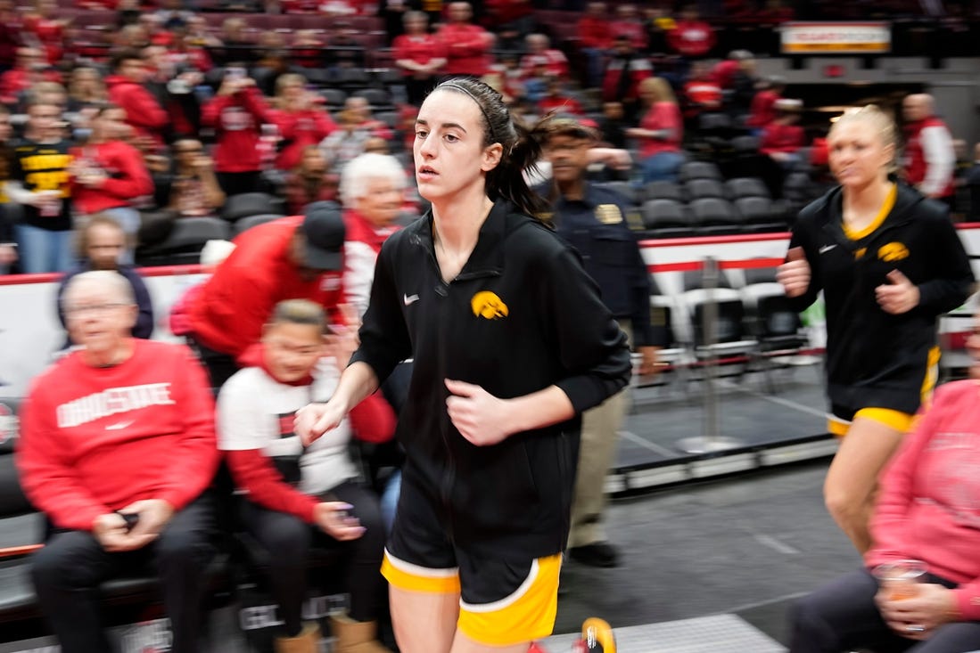 Jan 21, 2024; Columbus, Ohio, USA; Iowa Hawkeyes guard Caitlin Clark (22) takes the court for warm ups prior to the NCAA women   s basketball game against the Ohio State Buckeyes at Value City Arena.