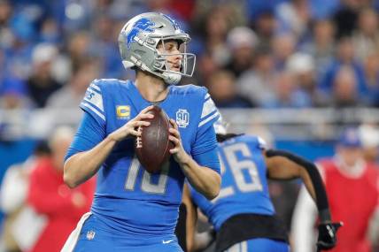 Detroit Lions quarterback Jared Goff (16) looks to pass against Tampa Bay Buccaneers during the first half of the NFC divisional round at Ford Field in Detroit on Sunday, Jan. 21, 2024.