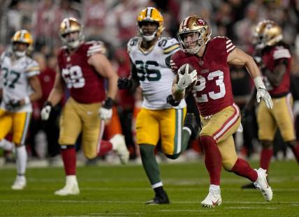 San Francisco 49ers running back Christian McCaffrey (23) scores a touchdown on a 39-yard run during the third quarter of their NFC divisional playoff game Saturday, January 20, 2024 at Levi         Stadium in Santa Clara, California. The San Francisco 49ers beat the Green Bay Packers 24-21.