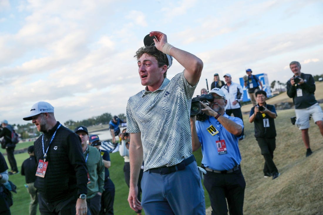 Nick Dunlap reacts after winning The American Express as the first amateur to win the PGA Tour event in 33 years in La Quinta, Calif., on Sunday, January 21, 2024.