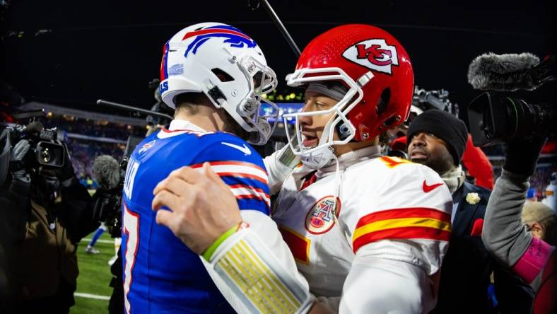 Jan 21, 2024; Orchard Park, New York, USA; Kansas City Chiefs quarterback Patrick Mahomes (15) greets Buffalo Bills quarterback Josh Allen (17) following the 2024 AFC divisional round game at Highmark Stadium. Mandatory Credit: Mark J. Rebilas-USA TODAY Sports