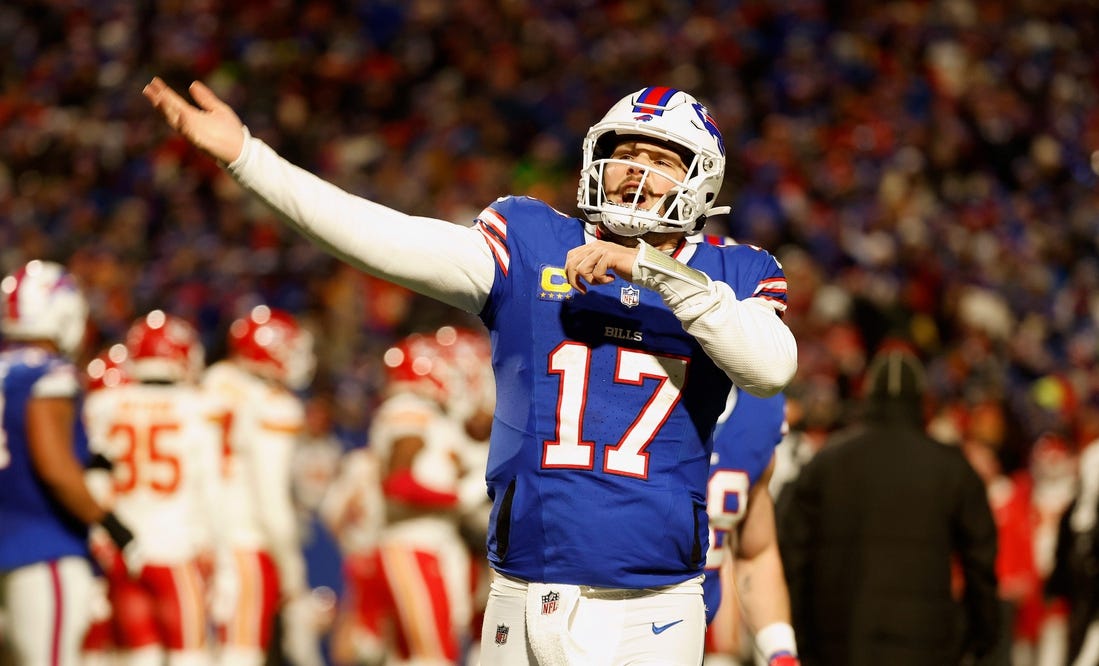 Buffalo Bills quarterback Josh Allen (17) reacts to his second touchdown to regain the lead against the Chiefs.