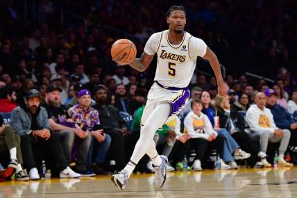 Jan 21, 2024; Los Angeles, California, USA; Los Angeles Lakers forward Cam Reddish (5) moves to the basket against the Portland Trail Blazers during the second half at Crypto.com Arena. Mandatory Credit: Gary A. Vasquez-USA TODAY Sports