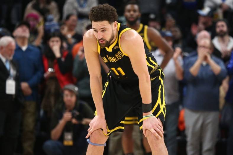 Jan 15, 2024; Memphis, Tennessee, USA; Golden State Warriors guard Klay Thompson (11) reacts during the second half against the Memphis Grizzlies at FedExForum. Mandatory Credit: Petre Thomas-USA TODAY Sports