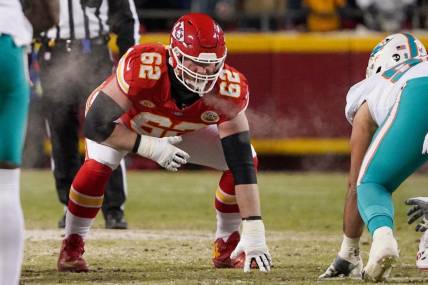 Jan 13, 2024; Kansas City, Missouri, USA; Kansas City Chiefs guard Joe Thuney (62) on the line of scrimmage against the Miami Dolphins in a 2024 AFC wild card game at GEHA Field at Arrowhead Stadium. Mandatory Credit: Denny Medley-USA TODAY Sports