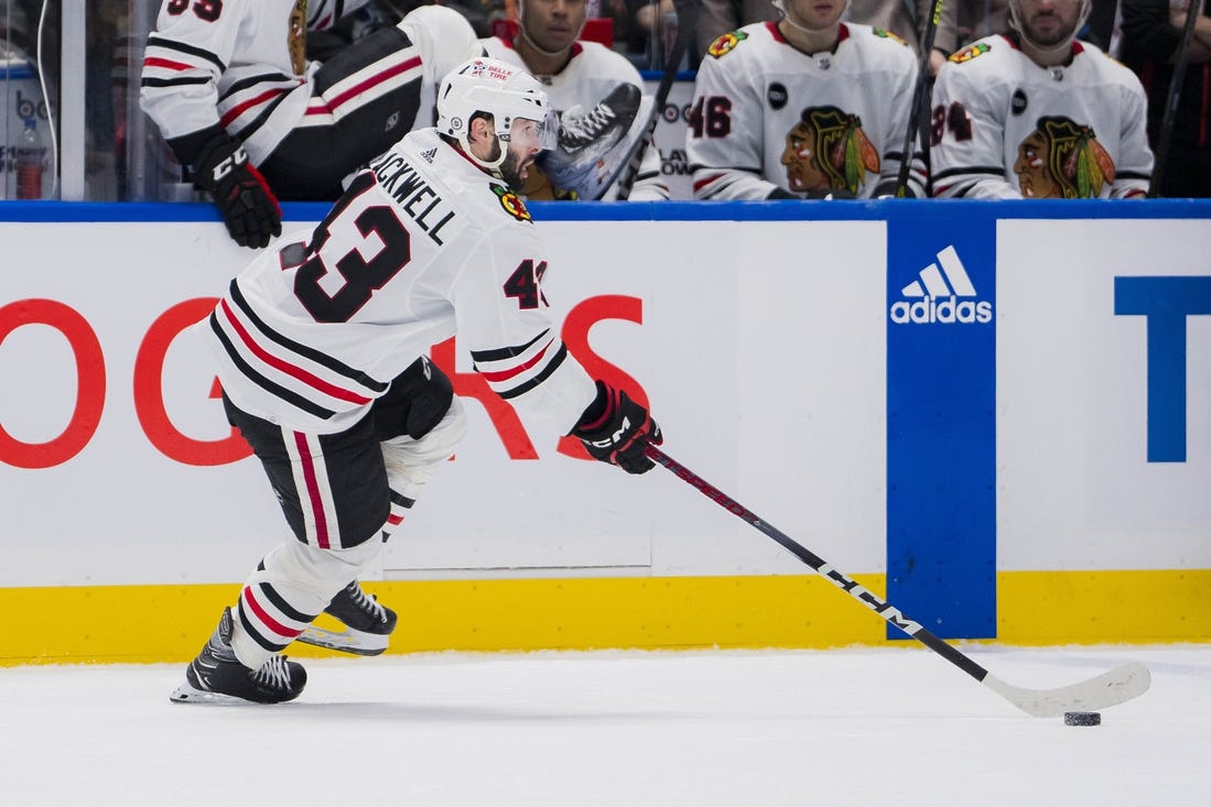 Jan 22, 2024; Vancouver, British Columbia, CAN; Chicago Blackhawks forward Colin Blackwell (43) handles the puck against the Vancouver Canucks in the third period at Rogers Arena. Canucks won 2-0. Mandatory Credit: Bob Frid-USA TODAY Sports