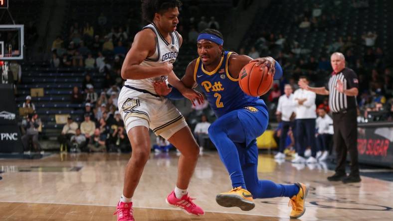 Jan 23, 2024; Atlanta, Georgia, USA; Pittsburgh Panthers forward Blake Hinson (2) is defended by Georgia Tech Yellow Jackets guard Dallan Coleman (3) in the first half at McCamish Pavilion. Mandatory Credit: Brett Davis-USA TODAY Sports