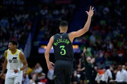 Jan 23, 2024; New Orleans, Louisiana, USA; New Orleans Pelicans guard CJ McCollum (3) celebrates a three-point basket against the Utah Jazz during the second half at Smoothie King Center. Mandatory Credit: Matthew Hinton-USA TODAY Sports
