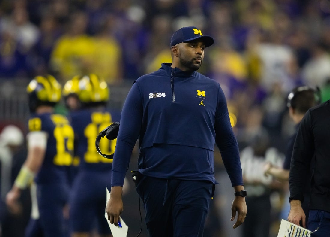 Jan 8, 2024; Houston, TX, USA; Michigan Wolverines offensive coordinator Sherrone Moore against the Washington Huskies during the 2024 College Football Playoff national championship game at NRG Stadium. Mandatory Credit: Mark J. Rebilas-USA TODAY Sports