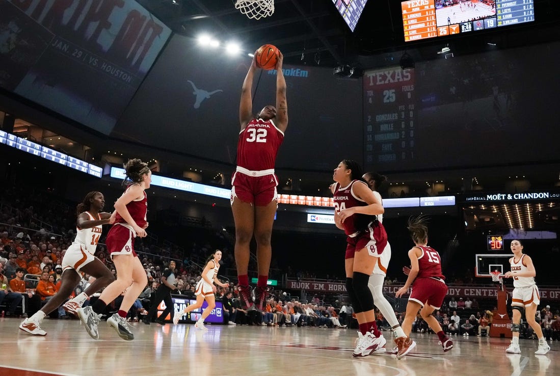 Oklahoma Sooners forward Sahara Williams (32) brings down a rebound during the first half of the Texas Longhorns' game against the Oklahoma Sooners at the Moody Center in Austin, Texas, Jan 24, 2024.