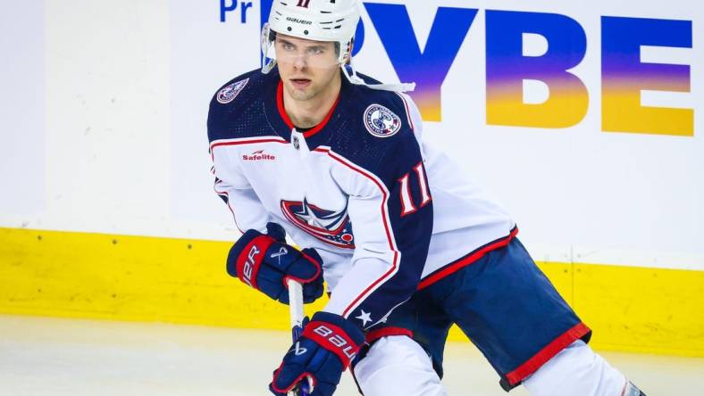 Jan 25, 2024; Calgary, Alberta, CAN; Columbus Blue Jackets center Adam Fantilli (11) skates during the warmup period against the Calgary Flames at Scotiabank Saddledome. Mandatory Credit: Sergei Belski-USA TODAY Sports