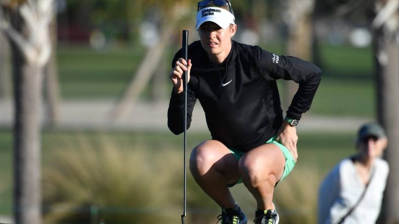 Nelly Korda, from Bradenton, Florida, studies her putt on the first hole Thursday, Jan. 25, 2024 at the LPGA Drive On Championship at the Bradenton Country Club in Bradenton, Florida.