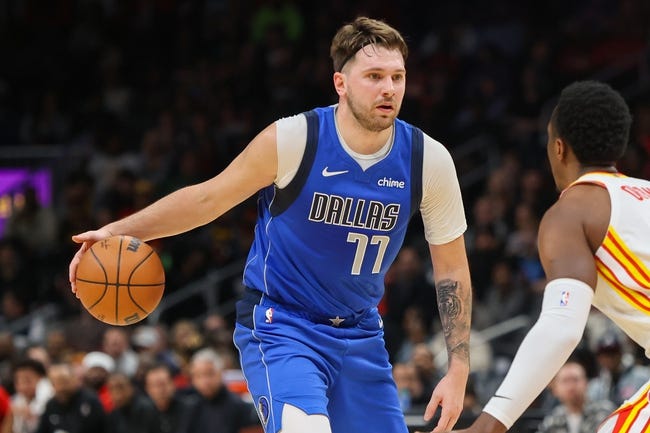 Jan 26, 2024; Atlanta, Georgia, USA; Dallas Mavericks guard Luka Doncic (77) dribbles against the Atlanta Hawks in the first quarter at State Farm Arena. Mandatory Credit: Brett Davis-USA TODAY Sports