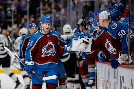Jan 26, 2024; Denver, Colorado, USA; Colorado Avalanche right wing Logan O'Connor (25) celebrates with the bench after his second goal of the game in the first period against the Los Angeles Kings at Ball Arena. Mandatory Credit: Isaiah J. Downing-USA TODAY Sports