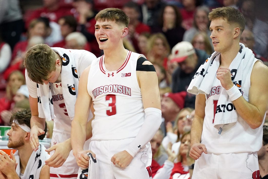 Jan 26, 2024; Madison, Wisconsin, USA; Wisconsin Badgers guard Connor Essegian (3) celebrates a basket during the second half against the Michigan State Spartans at the Kohl Center. Mandatory Credit: Kayla Wolf-USA TODAY Sports