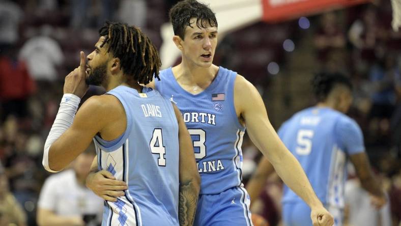 Jan 27, 2024; Tallahassee, Florida, USA; North Carolina Tarheels guard RJ Davis (4) and guard Cormac Ryan (3) celebrate after winning the game against the Florida State Seminoles at Donald L. Tucker Center. Mandatory Credit: Melina Myers-USA TODAY Sports