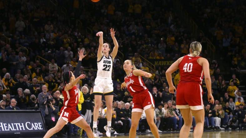 Iowa   s Caitlin Clark (22) shoots against Nebraska Saturday, Jan. 27, 2024 at Carver-Hawkeye Arena in Iowa City, Iowa.