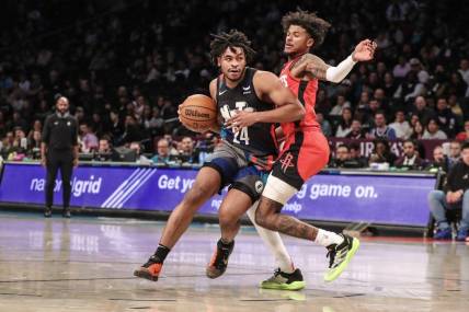 Jan 27, 2024; Brooklyn, New York, USA; Brooklyn Nets guard Cam Thomas (24) drives passed Houston Rockets guard Jalen Green (4) in the second quarter at Barclays Center. Mandatory Credit: Wendell Cruz-USA TODAY Sports