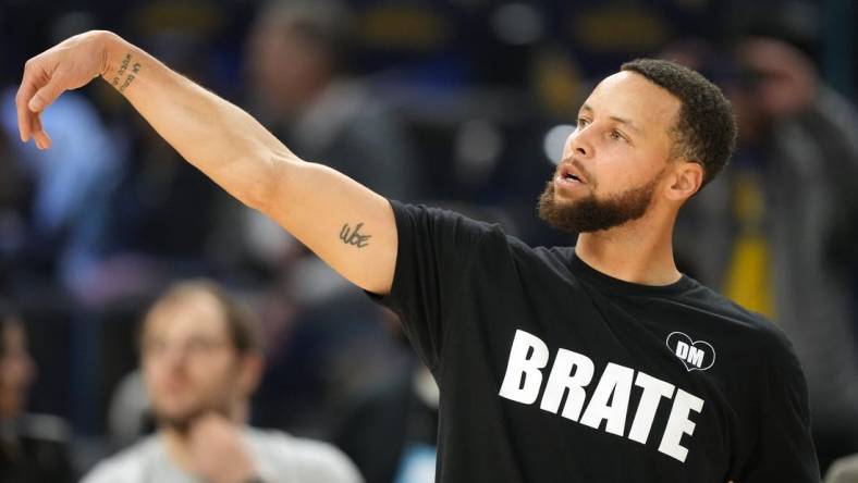 Jan 27, 2024; San Francisco, California, USA; Golden State Warriors guard Stephen Curry (30) warms up before the game against the Los Angeles Lakers at Chase Center. Mandatory Credit: Darren Yamashita-USA TODAY Sports
