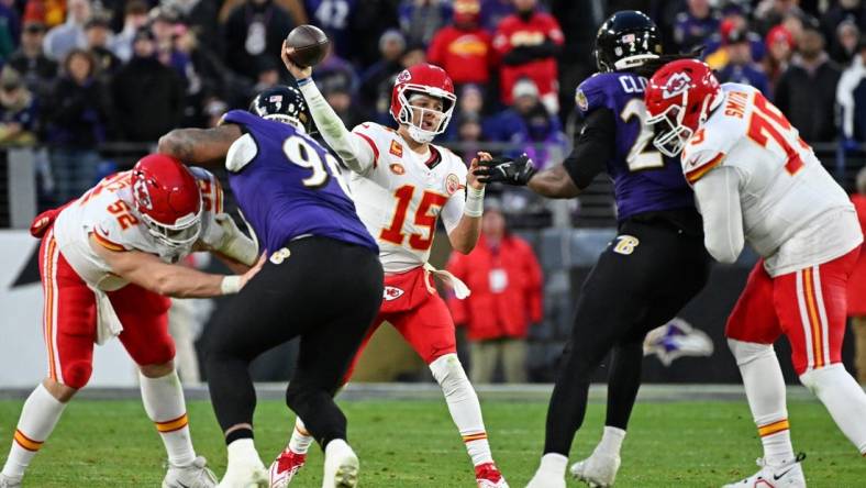 Jan 28, 2024; Baltimore, Maryland, USA; Kansas City Chiefs quarterback Patrick Mahomes (15) passes the ball against the Baltimore Ravens during the second half in the AFC Championship football game at M&T Bank Stadium. Mandatory Credit: Tommy Gilligan-USA TODAY Sports