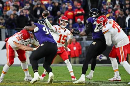 Jan 28, 2024; Baltimore, Maryland, USA; Kansas City Chiefs quarterback Patrick Mahomes (15) passes the ball against the Baltimore Ravens during the second half in the AFC Championship football game at M&T Bank Stadium. Mandatory Credit: Tommy Gilligan-USA TODAY Sports