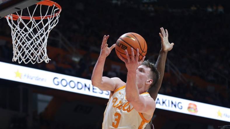 Jan 30, 2024; Knoxville, Tennessee, USA; Tennessee Volunteers guard Dalton Knecht (3) goes to the basket against the South Carolina Gamecocks during the first half at Thompson-Boling Arena at Food City Center. Mandatory Credit: Randy Sartin-USA TODAY Sports