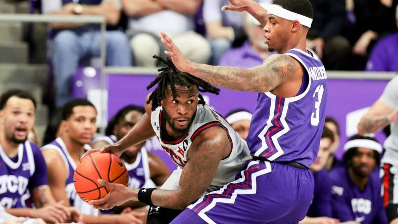 Jan 30, 2024; Fort Worth, Texas, USA;  Texas Tech Red Raiders guard Joe Toussaint (6) looks to pass as TCU Horned Frogs guard Avery Anderson III (3) defends during the first half at Ed and Rae Schollmaier Arena. Mandatory Credit: Kevin Jairaj-USA TODAY Sports