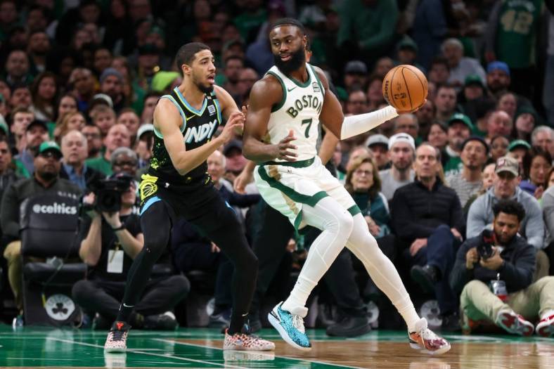 Jan 30, 2024; Boston, Massachusetts, USA; Boston Celtics forward Jaylen Brown (7) drives to the basket during the first half against the Indiana Pacers at TD Garden. Mandatory Credit: Paul Rutherford-USA TODAY Sports