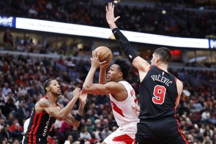 Jan 30, 2024; Chicago, Illinois, USA; Toronto Raptors forward Scottie Barnes (4) drives to the basket against the Chicago Bulls during the first half at United Center. Mandatory Credit: Kamil Krzaczynski-USA TODAY Sports
