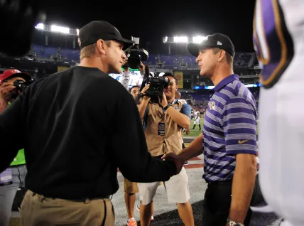 Jim Harbaugh vs. John Harbaugh: Which brother is the better football coach, the national champion or the Super Bowl champion?