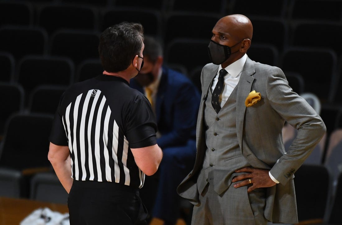 Feb 17, 2021; Nashville, Tennessee, USA; Vanderbilt Commodores head coach Jerry Stackhouse questions an official on a call during the second half against the Kentucky Wildcats at Memorial Gymnasium. Mandatory Credit: Christopher Hanewinckel-USA TODAY Sports