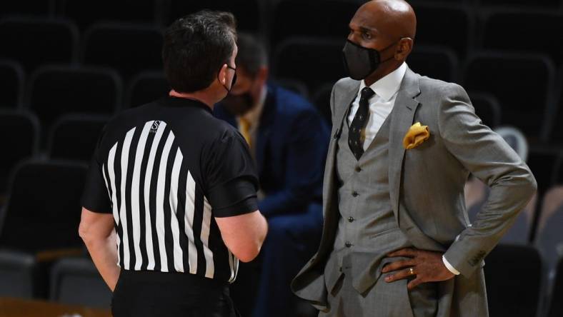 Feb 17, 2021; Nashville, Tennessee, USA; Vanderbilt Commodores head coach Jerry Stackhouse questions an official on a call during the second half against the Kentucky Wildcats at Memorial Gymnasium. Mandatory Credit: Christopher Hanewinckel-USA TODAY Sports