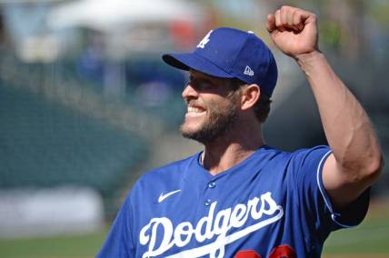 Los Angeles Dodgers starting pitcher Clayton Kershaw (22) waves to fans. Mandatory Credit: Joe Camporeale-USA TODAY Sports