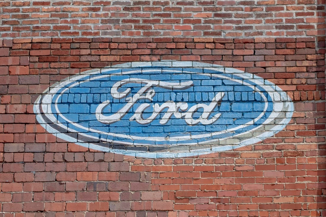 The Ford logo is still emblazoned on the side of 1023 Wheeling Avenue. Once the location of Ken Bender motors, the building now houses Dutch Concepts Furniture store.

Historic 900 1000 Block 8