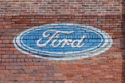 The Ford logo is still emblazoned on the side of 1023 Wheeling Avenue. Once the location of Ken Bender motors, the building now houses Dutch Concepts Furniture store.

Historic 900 1000 Block 8