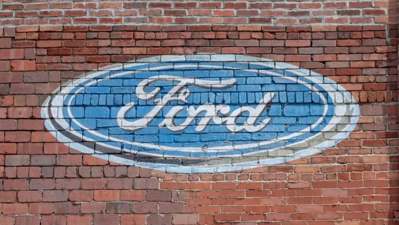 The Ford logo is still emblazoned on the side of 1023 Wheeling Avenue. Once the location of Ken Bender motors, the building now houses Dutch Concepts Furniture store.

Historic 900 1000 Block 8