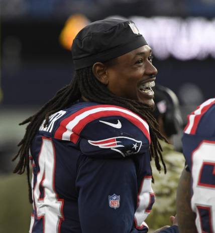 Nov 14, 2021; New England Patriots outside linebacker Dont'a Hightower (54) laughs on the sidelines during the second half against the Cleveland Browns at Gillette Stadium. Foxborough, Massachusetts, USA;  Mandatory Credit: Bob DeChiara-USA TODAY Sports