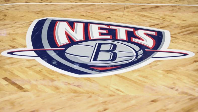 Nov 17, 2021; Brooklyn, New York, USA; The old Nets logo on the court prior to the game between the Cleveland Cavilers and the Brooklyn Nets at Barclays Center. Mandatory Credit: Wendell Cruz-USA TODAY Sports