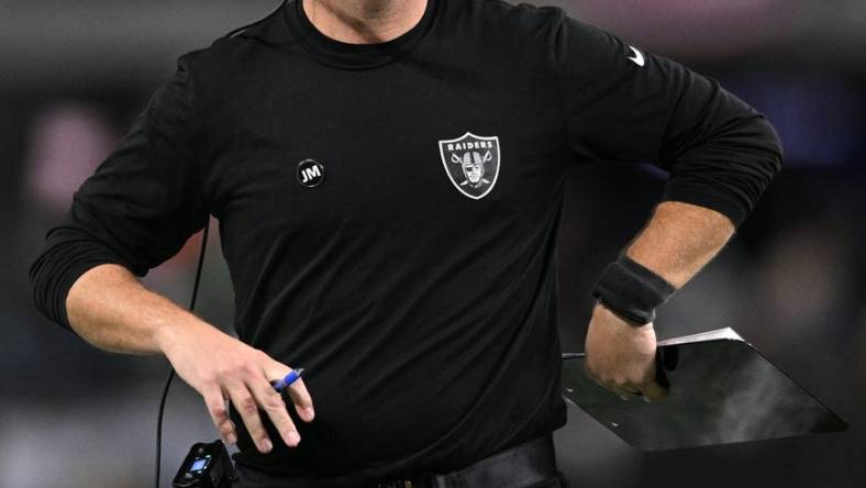 Jan 9, 2022; Paradise, Nevada, USA; Las Vegas Raiders assistant wide receivers coach Nick Holz looks on during the first half against the Los Angeles Chargers at Allegiant Stadium. Mandatory Credit: Orlando Ramirez-USA TODAY Sports