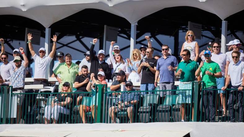 Feb. 12, 2022; Scottsdale Arizona, USA; Fans sit and cheer in the grandstands on hole 16 during Round 3 at the WM Phoenix Open. Mandatory Credit: Alex Gould - The Republic

Wm Phx Open Round 3