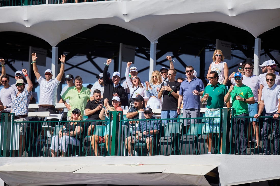Feb. 12, 2022; Scottsdale Arizona, USA; Fans sit and cheer in the grandstands on hole 16 during Round 3 at the WM Phoenix Open. Mandatory Credit: Alex Gould - The Republic

Wm Phx Open Round 3