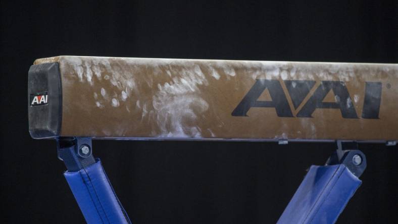 Apr 16, 2022; Fort Worth, TX, USA; A view of balance beam and powder marks during the warmups before the finals of the 2022 NCAA women's gymnastics championship at Dickies Arena. Mandatory Credit: Jerome Miron-USA TODAY Sports