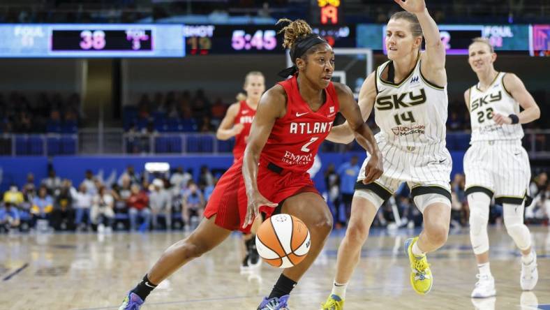 Jun 17, 2022; Chicago, Illinois, USA; Atlanta Dream guard Aari McDonald (2) drives to the basket against Chicago Sky guard Allie Quigley (14) during the first half of a WNBA game at Wintrust Arena. Mandatory Credit: Kamil Krzaczynski-USA TODAY Sports