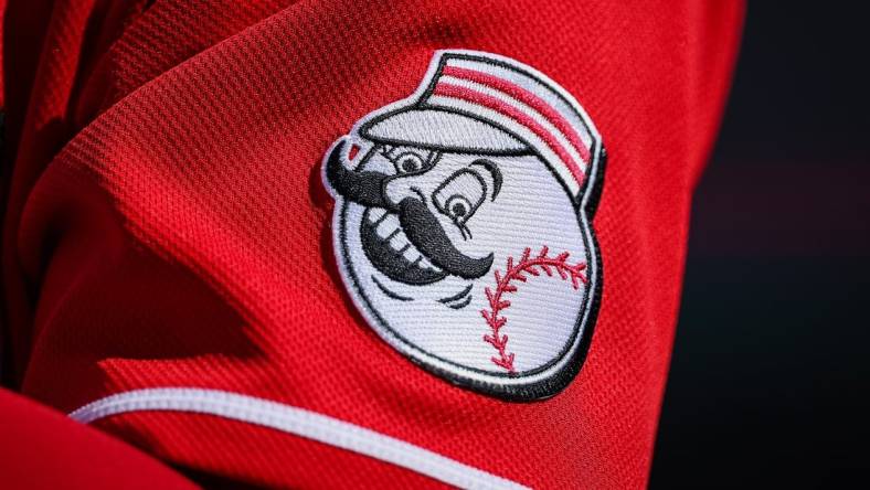 Aug 28, 2022; Washington, District of Columbia, USA; A detailed view of the Cincinnati Reds jersey logo during the ninth inning of the game between the Washington Nationals and the Cincinnati Reds at Nationals Park. Mandatory Credit: Scott Taetsch-USA TODAY Sports