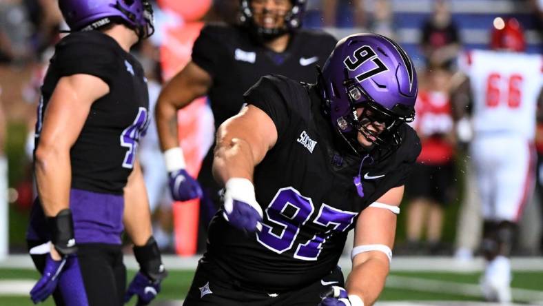 Furman Paladins defensive tackle Bryce Stanfield (97) celebrates after a play against North Greenville Crusaders at Paladin Stadium in Greenville, Thursday, September 1, 2022.

Jg Furman 090122 0047