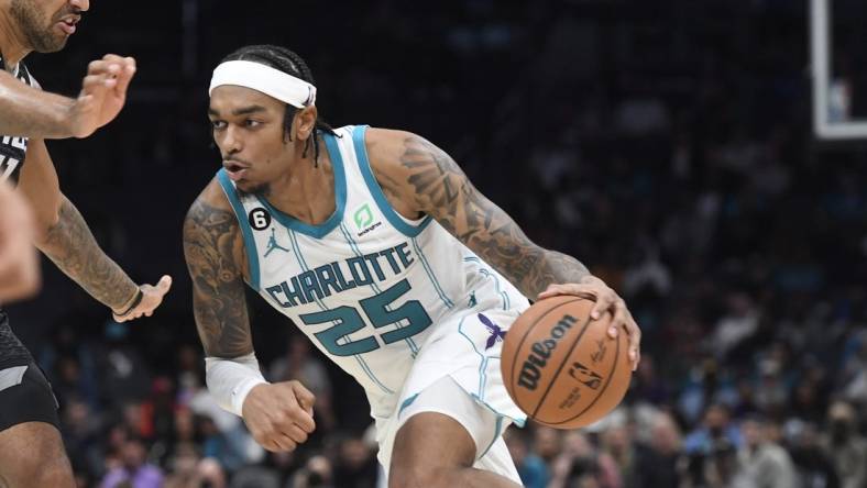 Oct 31, 2022; Charlotte, North Carolina, USA; Charlotte Hornets forward center PJ Washington (25) dribbles the ball during the second half against the Sacramento Kings at the Spectrum Center. Mandatory Credit: Sam Sharpe-USA TODAY Sports