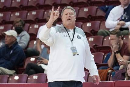 Nov 20, 2022; Charleston, South Carolina, USA; Old Dominion Monarchs head coach Jeff Jones signals his team in the first half against the Davidson Wildcats at TD Arena. Mandatory Credit: David Yeazell-USA TODAY Sports