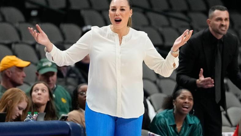 Dec 18, 2022; Dallas, Texas, USA; Arizona Wildcats head coach Adia Barnes reacts to a call against the Baylor Lady Bears during the first half at American Airlines Center. Mandatory Credit: Chris Jones-USA TODAY Sports