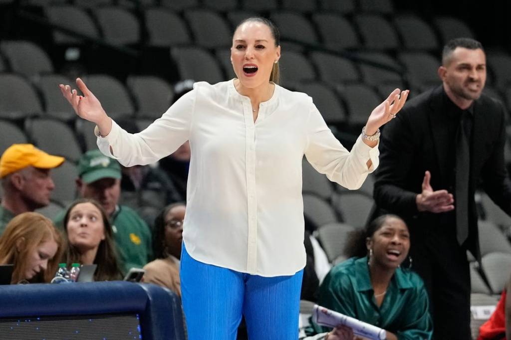 Dec 18, 2022; Dallas, Texas, USA; Arizona Wildcats head coach Adia Barnes reacts to a call against the Baylor Lady Bears during the first half at American Airlines Center. Mandatory Credit: Chris Jones-USA TODAY Sports
